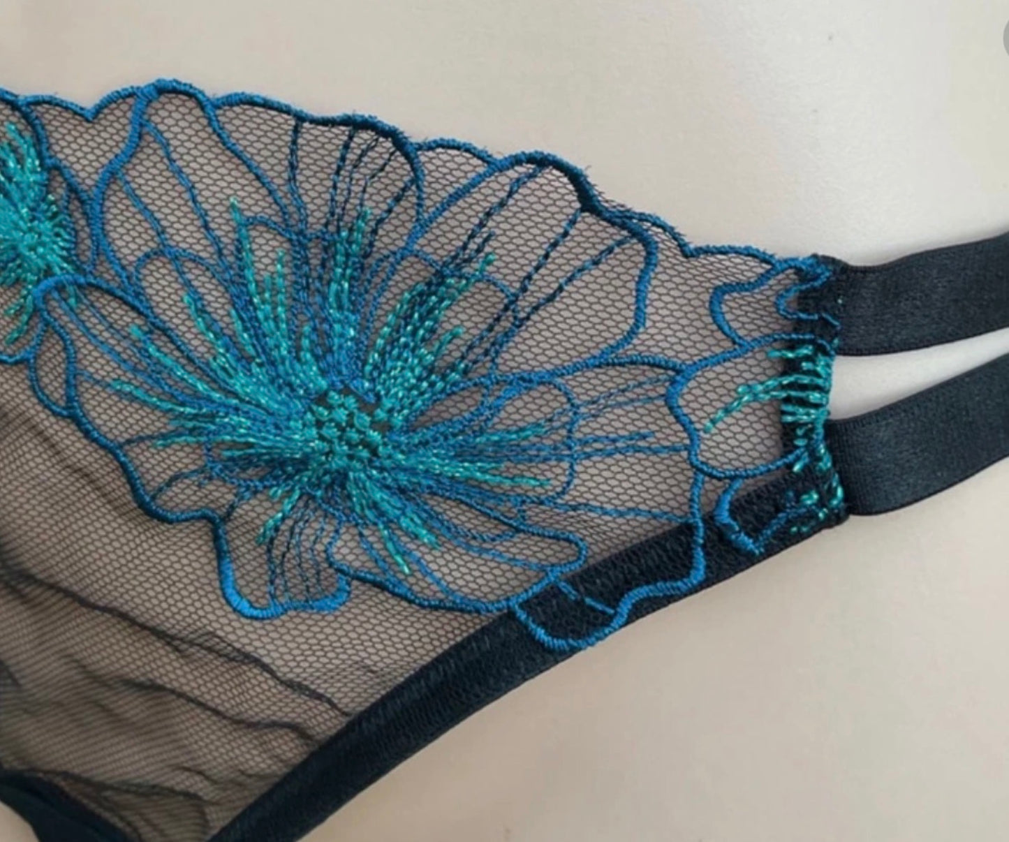 ‘Alexis embroidered’ thong in black/teal